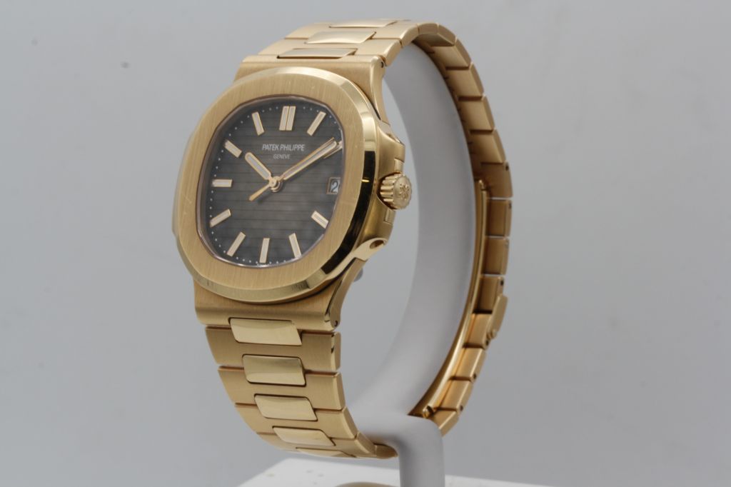 Patek Philippe Nautilus Mad Watch Quartz Movement Black Dial Goledn St ...