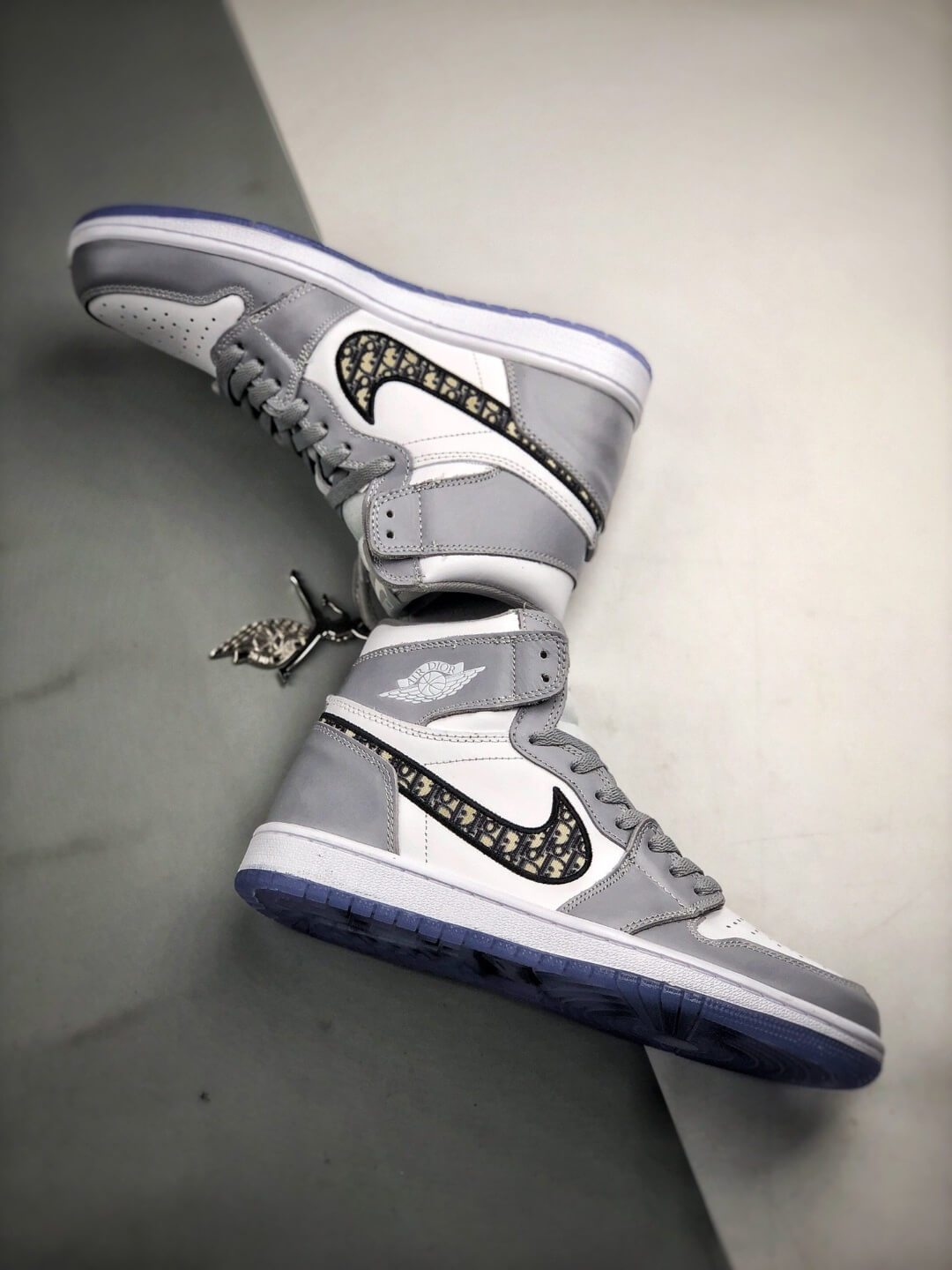 The Nike Dior x Air Jordan High Sneaker White and Grey Upper Top