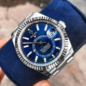 Rolex The Oyster Perpetual Sky-Dweller in White Rolesor with a bright blue dial and an Oyster bracelet. RLX Sky-Dweller RLX-DWELLER