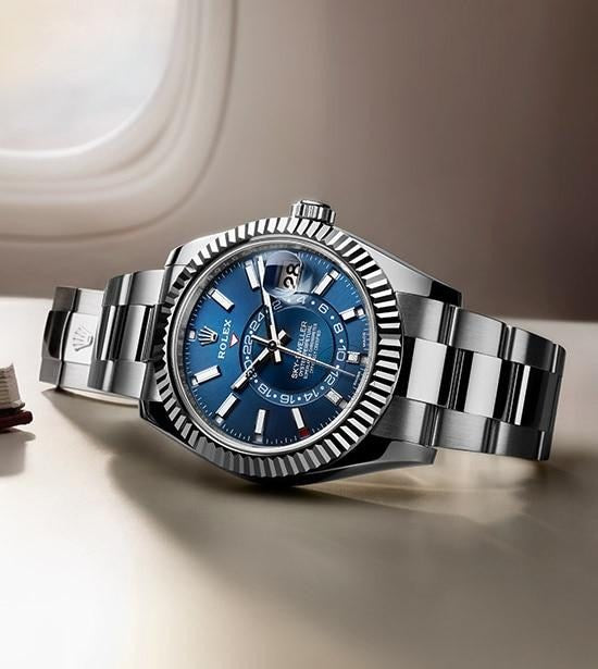 Oyster Perpetual Sky-Dweller in White Rolesor with a bright blue dial and an Oyster bracelet. RLX Sky-Dweller RLX-DWELLER