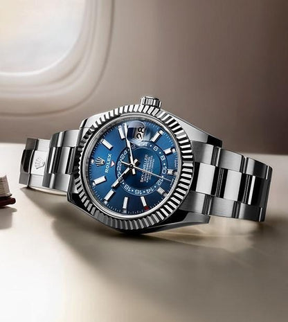 Oyster Perpetual Sky-Dweller in White Rolesor with a bright blue dial and an Oyster bracelet. RLX Sky-Dweller RLX-DWELLER